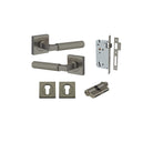 Pair of Iver Brunswick lever door handles on square rose, featuring a sleek, modern design in a polished finish.