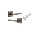 Pair of Iver Baltimore lever handles on square rose, featuring a sleek, modern design for residential or commercial doors.