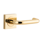 Pair of Iver Oslo Lever on Square Rose architectural hardware door handles in a sleek metal finish.