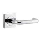 Pair of Iver Oslo Lever handles on square rose, architectural hardware with sleek, modern design for doors.