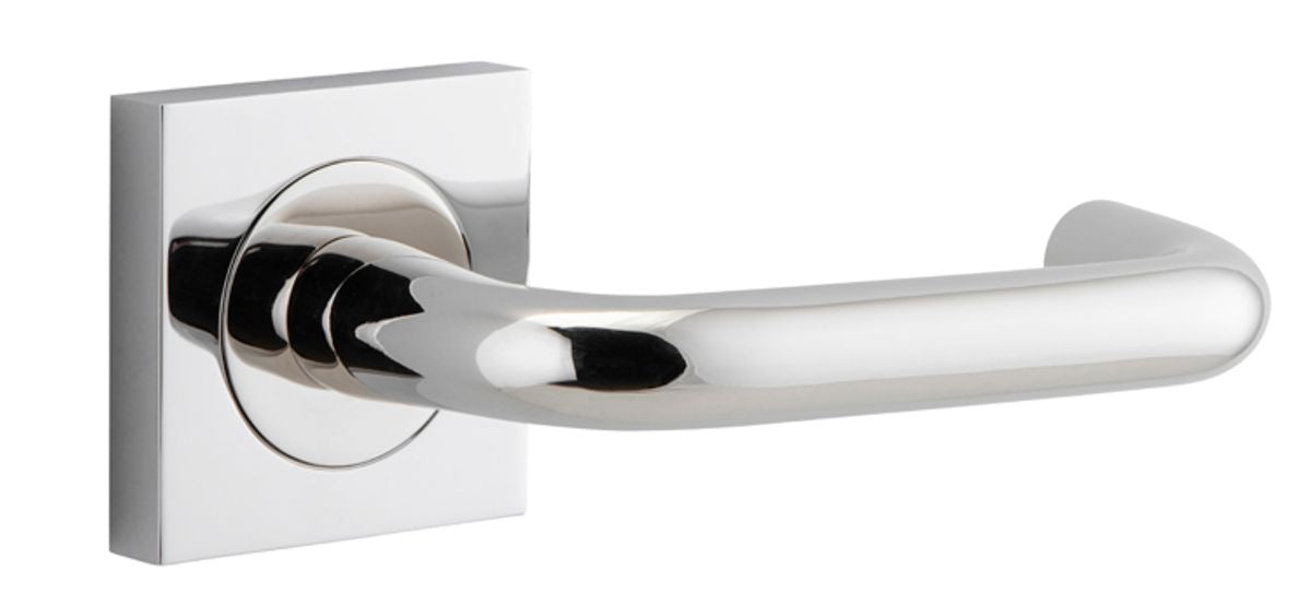 Pair of Iver Oslo lever handles on square rose for architectural hardware, featuring sleek metal finish and modern design.
