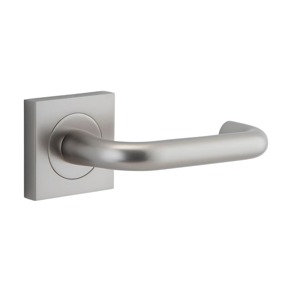 Pair of Iver Oslo Lever handles on square rose, architectural hardware with modern design for doors.