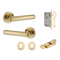 Pair of Iver Puerto Lever handles on round rose plates, featuring a sleek, modern design in a polished finish.