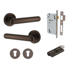 Pair of Iver Puerto Lever handles on round rose, featuring a sleek, modern design in a polished finish.