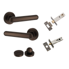 Pair of Iver Puerto Lever on round rose door hardware in black finish, showcasing elegant modern design.