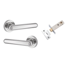 Pair of Iver Puerto lever handles on round rose, featuring a sleek design in black finish for interior door hardware.