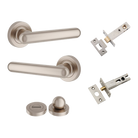Pair of Iver Puerto lever handles on round rose, featuring a sleek finish and modern design for door installation.
