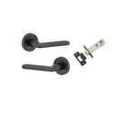 Pair of Iver Baltimore lever door handles on round rose, featuring a sleek metallic finish and modern design.