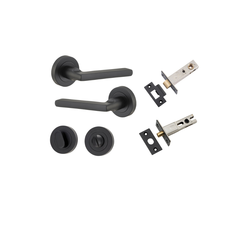 Pair of Iver Baltimore lever door handles on round rose, featuring a sleek black finish and modern design.