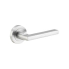 Pair of Iver Baltimore lever door handles on round rose, featuring vintage-style black finish and classic design.