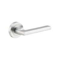 Pair of Iver Baltimore lever door handles on round rose, featuring vintage-style black finish and classic design.