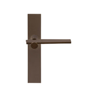 Pair of Formani TENSE lever handles on rectangular backplates, showcasing sleek, modern door hardware design.