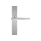 Pair of Formani TENSE lever handles on rectangular backplates in a sleek, modern design, shown in a close-up image.