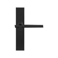 Pair of Formani TENSE lever handles on rectangular backplates, showcasing sleek modern door hardware design.