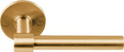 Pair of Formani ONE XL 15Ø lever handles on round rose, showcasing sleek, modern design in a polished finish.