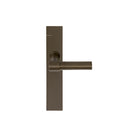 Pair of Formani ONE Lever door handles with 20mm diameter on rectangular plates, showcasing sleek modern design and polished finish.