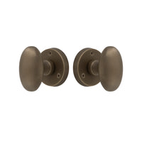 Knob Latch Oval in Roman Brass