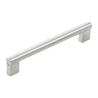 Momo BARLETTA cabinet pull handle in stainless steel with a sleek, modern design, mounted on a cabinet door.