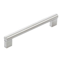 Momo BARLETTA cabinet pull handle in stainless steel with a sleek, modern design, mounted on a cabinet door.
