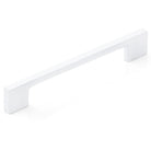 Momo LIVORNO cabinet pull handle in white with a sleek, modern design, mounted on a cabinet door.