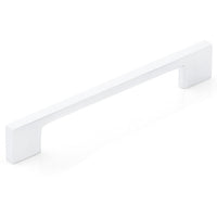 Momo LIVORNO cabinet pull handle in white with a sleek, modern design, mounted on a cabinet door.