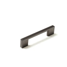 Momo LIVORNO cabinet pull handle in matte black finish, shown installed on a modern kitchen cabinet door.