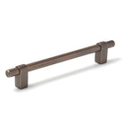 Momo MAIDA cabinet pull handle in brushed aluminum finish, mounted on a cabinet door for modern kitchen or furniture decor.