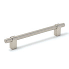 Momo MAIDA cabinet pull handle in dark bronze finish mounted on a cabinet door, showcasing modern kitchen hardware.
