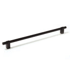 Momo MAIDA cabinet pull handle in matte black finish mounted on a wooden cabinet, showcasing sleek modern hardware design