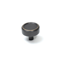 Momo Monaco cabinet knob with a sleek brushed brass finish, round shape, and modern design for furniture hardware.