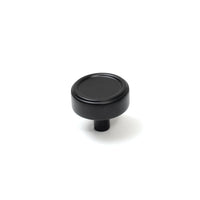 Momo Monaco Cabinet Knob in matte black finish, round metal handle suitable for kitchen or furniture drawers.