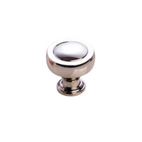 Momo PELLARO cabinet knob in brushed nickel finish, round design with textured surface for modern kitchen or furniture drawer.