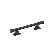 Momo Pembrey cabinet pull handle in black with sleek, modern design, mounted on a wooden cabinet door.