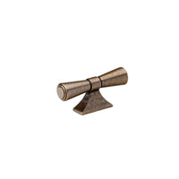 Momo Pembrey cabinet T-pull handle in bronze finish mounted on a cabinet door, showcasing sleek modern design.