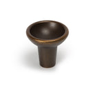 Momo RAVIOLO cabinet knob with a sleek, modern design in brushed metallic finish, mounted on a wooden cabinet.