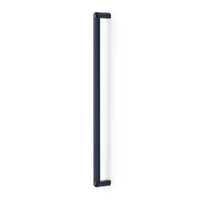 Momo RISS large cabinet pull handle in black finish, mounted on a wooden cabinet door, showcasing modern hardware design.