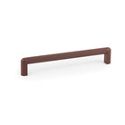 Momo RISS Mini Cabinet Pull Handle in vibrant red, showcasing a sleek, modern design for cabinets or drawers.