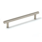 Momo STRANO cabinet pull handle in dark bronze finish mounted on a cabinet door.