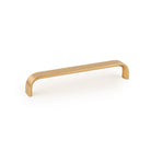 Momo SENSE cabinet pull handle in brushed bronze finish, modern design, installed on a wooden cabinet door.