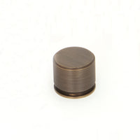 Momo SUSSEX cabinet knob in brushed nickel finish with rounded design, mounted on a wooden cabinet door.
