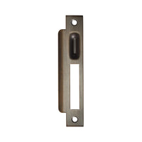 Brass Momo Roller Mortice Lock Strike Plate installed on door frame, designed for secure locking and durability.