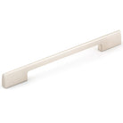 Momo VIESTE cabinet pull handle in brushed gold finish mounted on a wooden cabinet door
