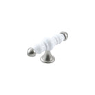 Momo Trianon ceramic cabinet T-pull handle in white and brown finish mounted on a cabinet door