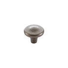 Momo Crosby round cabinet knob in white with a polished finish, mounted on a wooden drawer.
