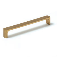 Black and silver Momo VENA cabinet pull handle with sleek, modern design, mounted on a cabinet door.