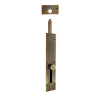 Windsor reverse barrel bolt in black finish mounted on wooden door for secure latching and privacy.