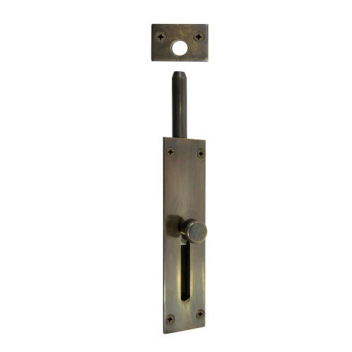 Windsor reverse barrel bolt in polished brass mounted on a door for security and privacy.