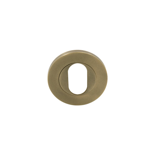 NIDO Oval Escutcheon, Single in Roman Brass