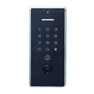 Yale Libi digital deadbolt lock with keypad and key backup, installed on a modern door for secure home entry.
