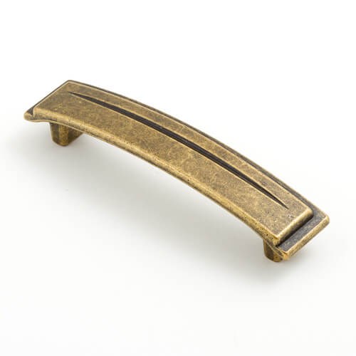 Castella Chisel Cabinet Pull Handle in Antique Brass